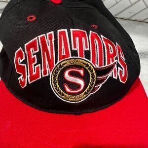 vintage Doublelogo NHL Ottawa senators fitted black hat. Size 6 3/4. Made in USA